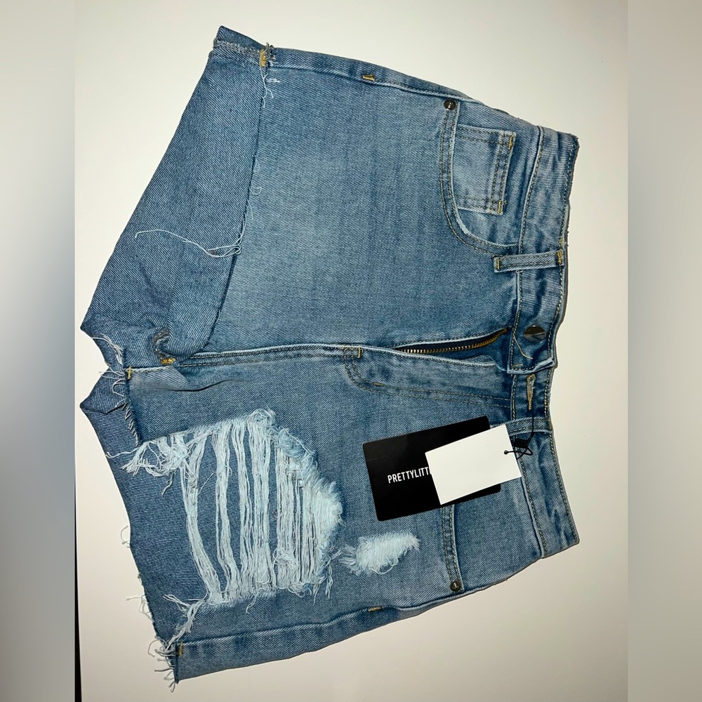 light blue washed distressed denim mom shorts